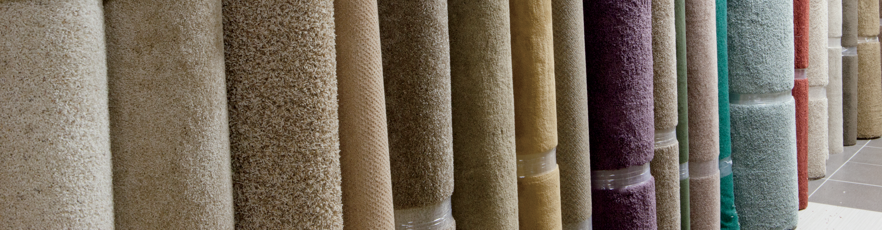 rolls of different color carpet remnants